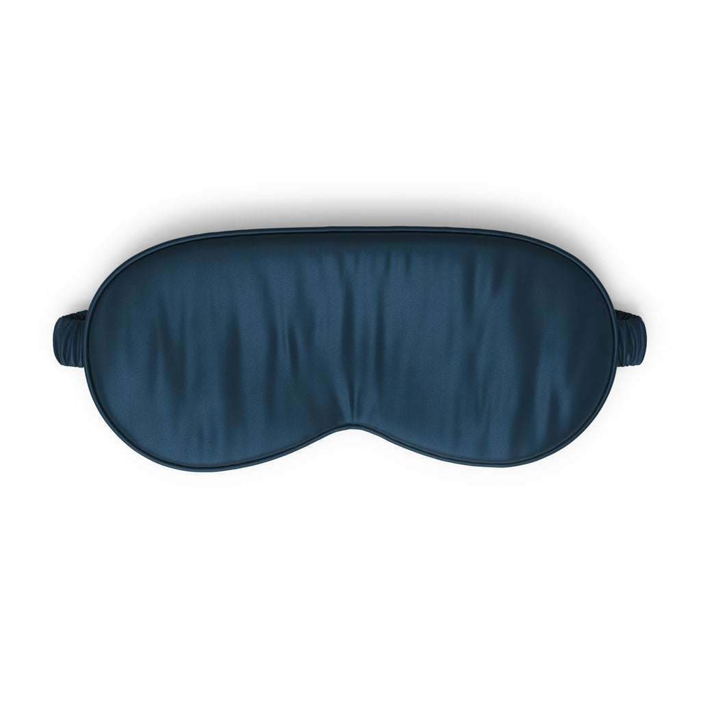 Navy blue sleep mask on a white background